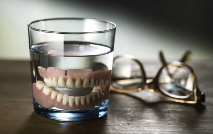 dentures in glass