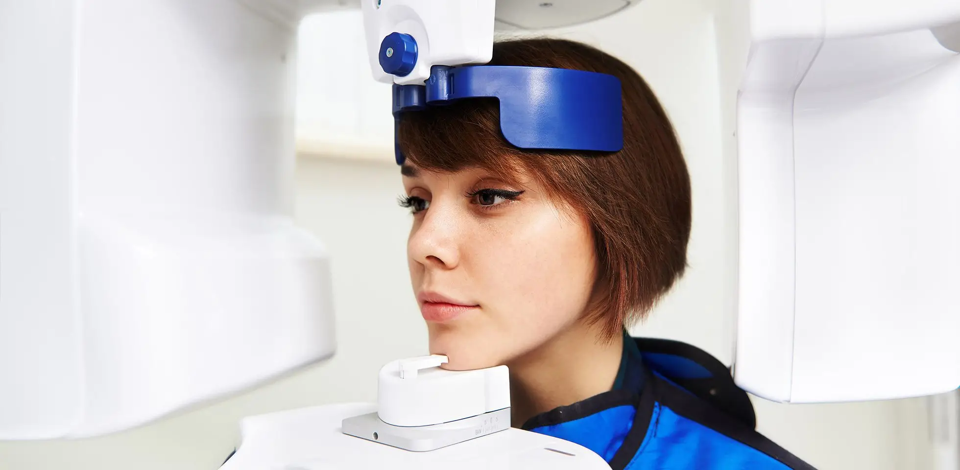 A person posing for digital dental X-Rays near me