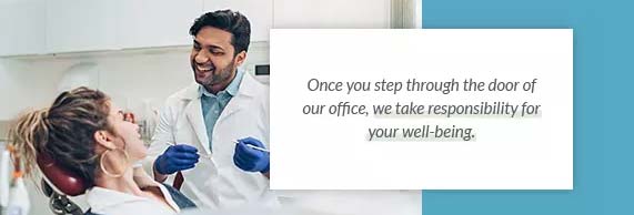 A dentist and patient talking