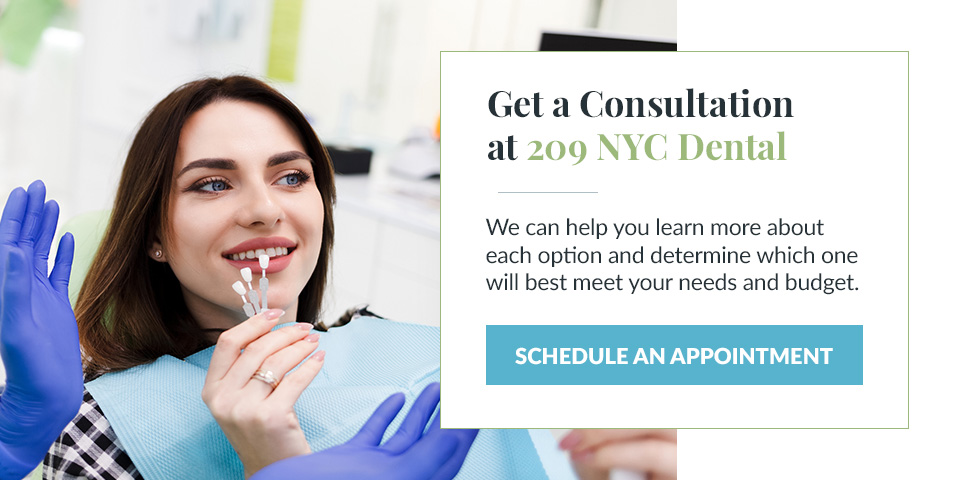 A person in a dentist’s office asking about the cost of veneers in NYC